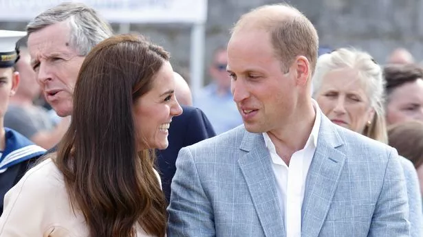 Prince William and Kate Middleton looking at each other and smiling