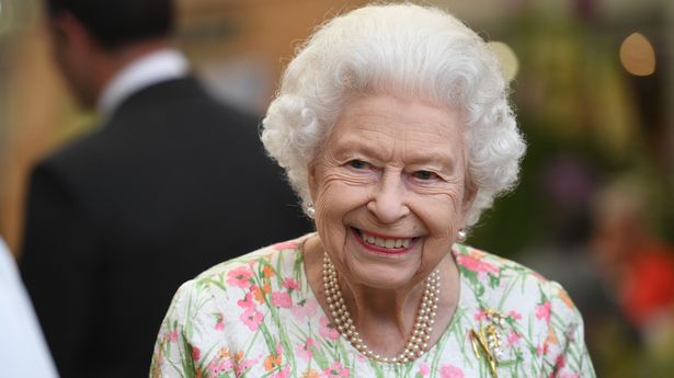 The late Queen Elizabeth II smiling